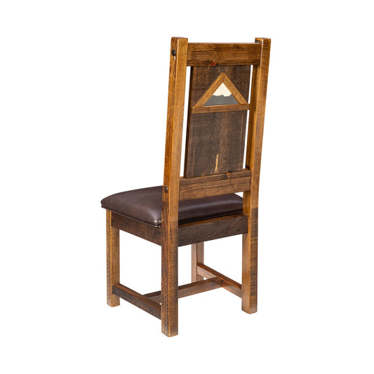 Classic rustic chair with upholstered seat and log legs